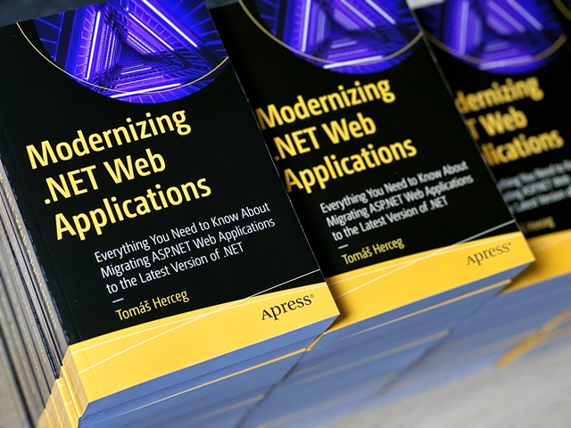 A pile of copies of my new book Modernizing .NET Web Applications